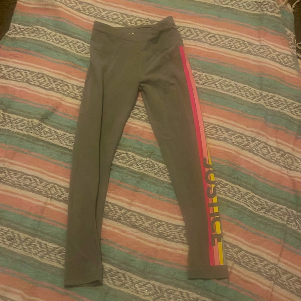 The colors of these leggings are yellow cyan hot pink and light pink